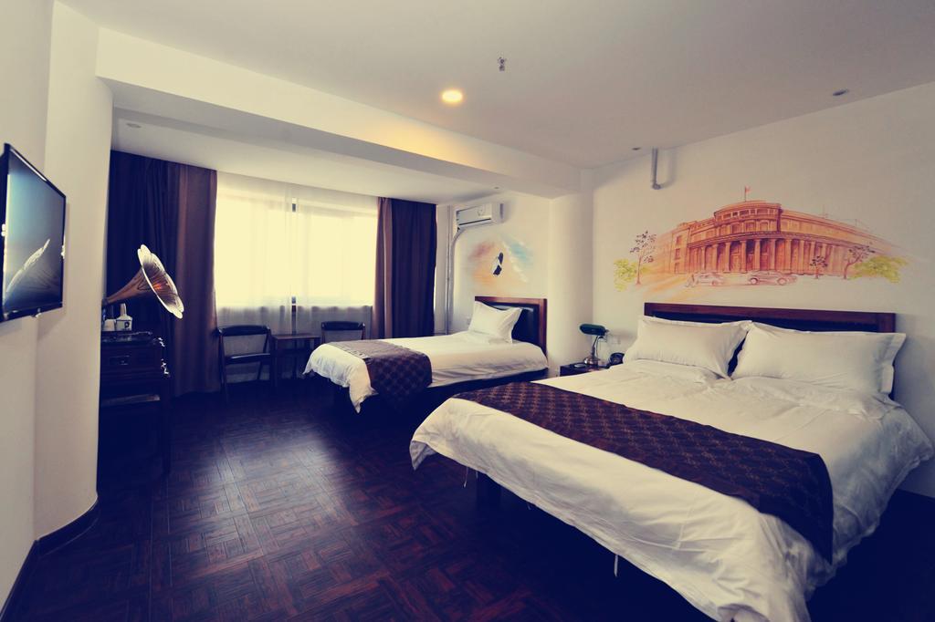 Nostalgiahotel-Tianjinguozhancenter Rum bild