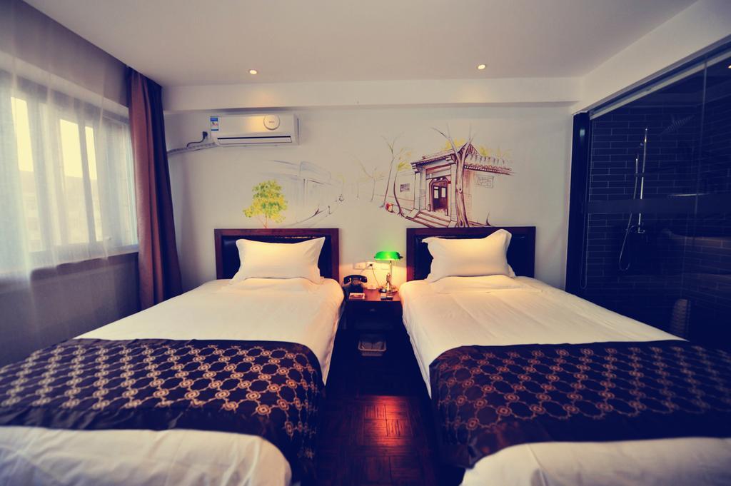 Nostalgiahotel-Tianjinguozhancenter Rum bild